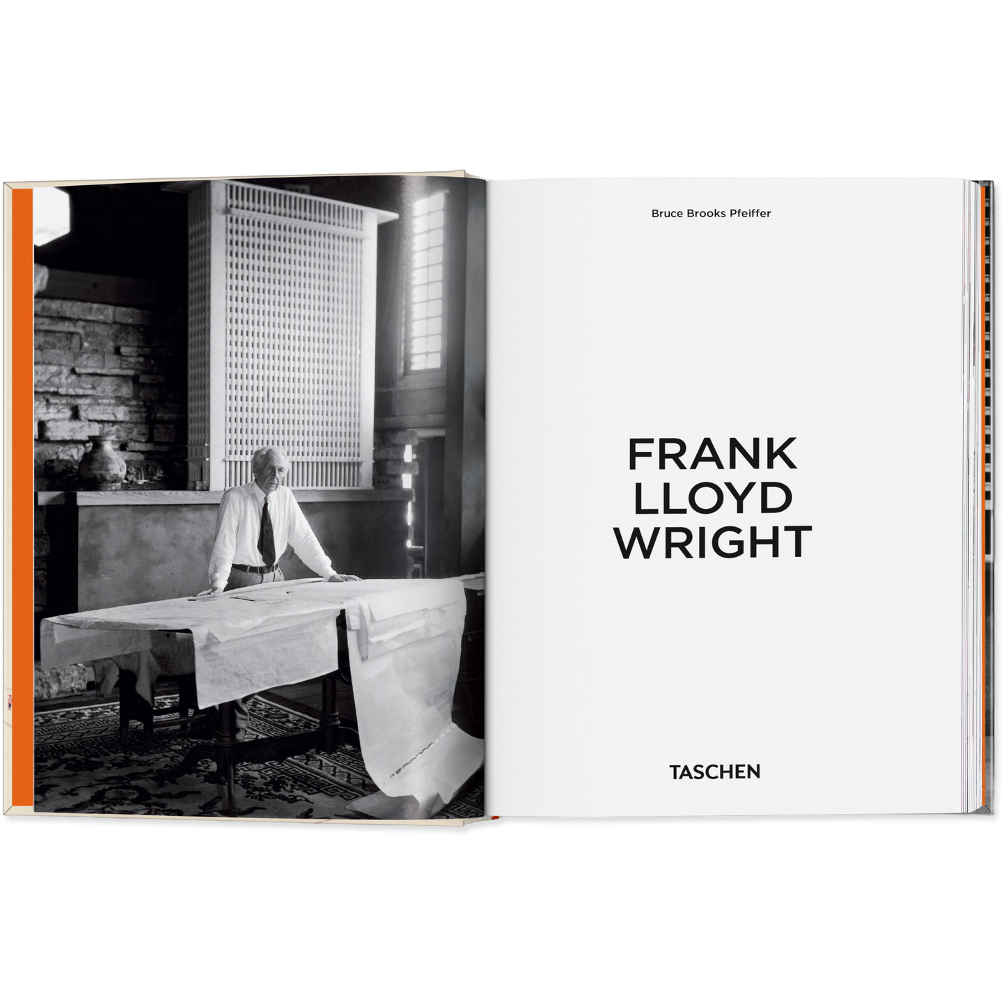 Book open to a page featuring black and white photograph of Frank Lloyd Wright and text.