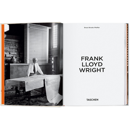 Book open to a page featuring black and white photograph of Frank Lloyd Wright and text.