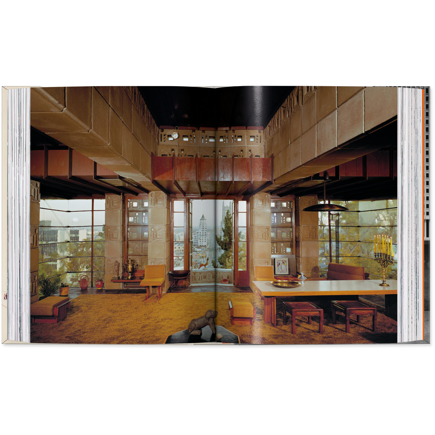 Interior of a modern office space with large windows and wooden furniture.