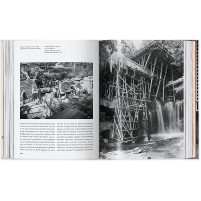 Open book showing black and white photographs of a wooden structure over a waterfall.