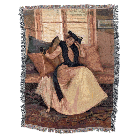 Woven blanket with a woman sitting on a couch design