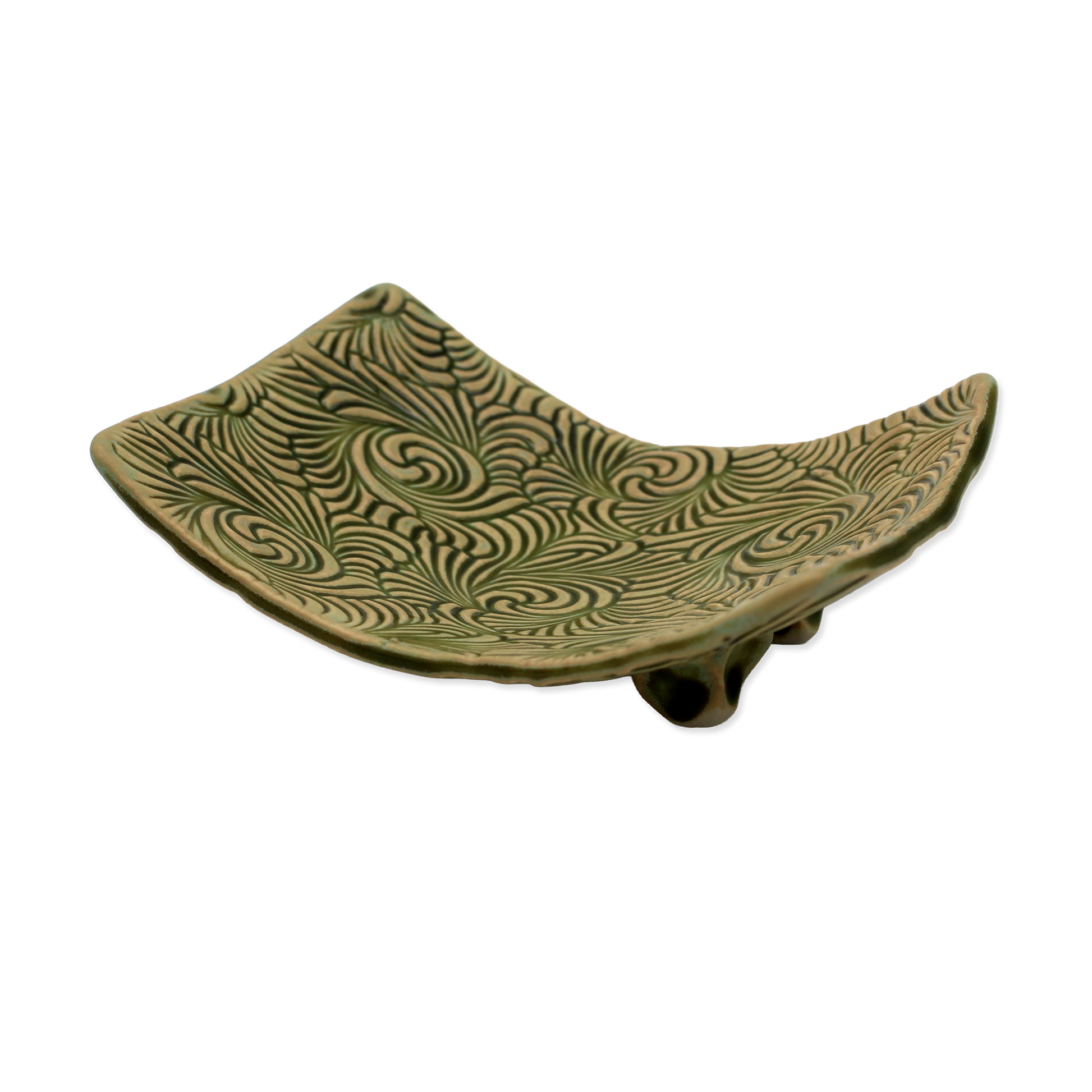 Green ceramic dish with wavy pattern on a white background