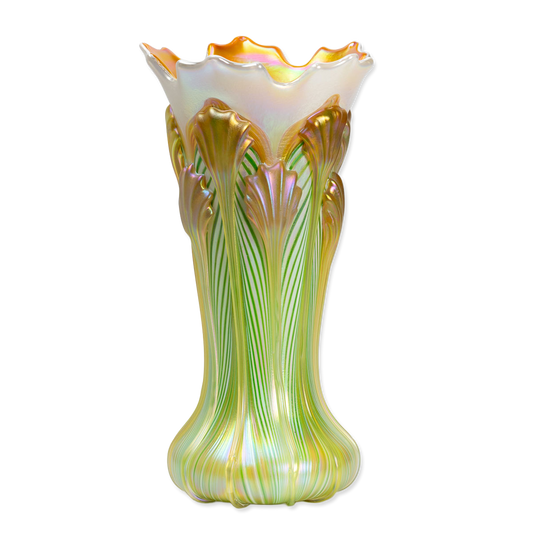 Decorative glass vase with green and gold patterns on a white background
