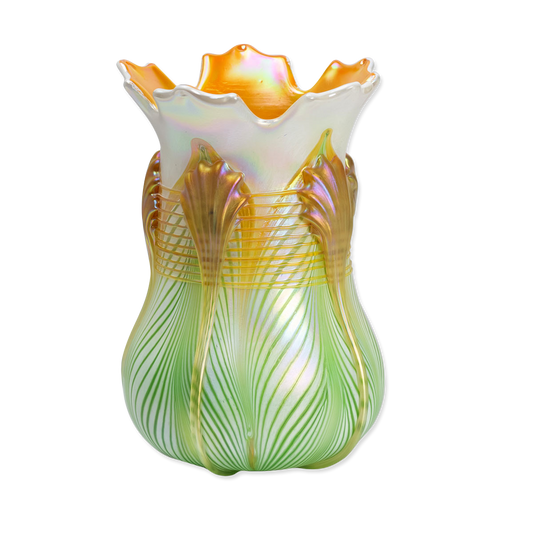 Decorative glass vase with green and gold patterns on a white background