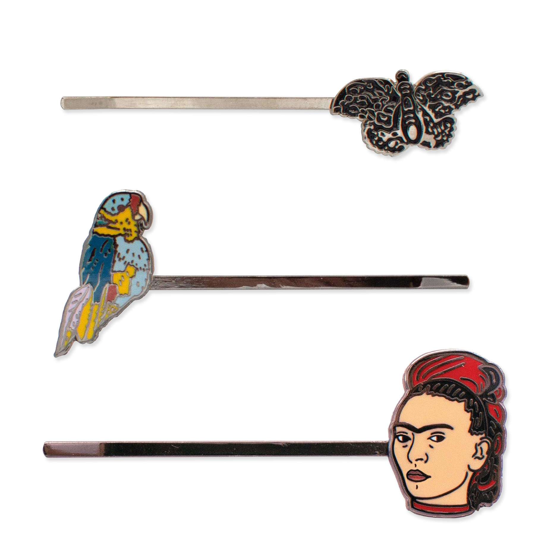 Set of hair pins with parrot, butterfly, and Frida Kahlo designs on a white background