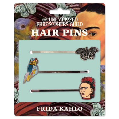 Set of 3 decorative enamel pins, on an illustrated package with white lettering.