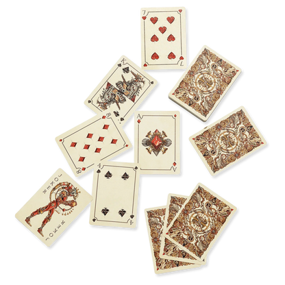Set of playing cards with intricate designs on a white background