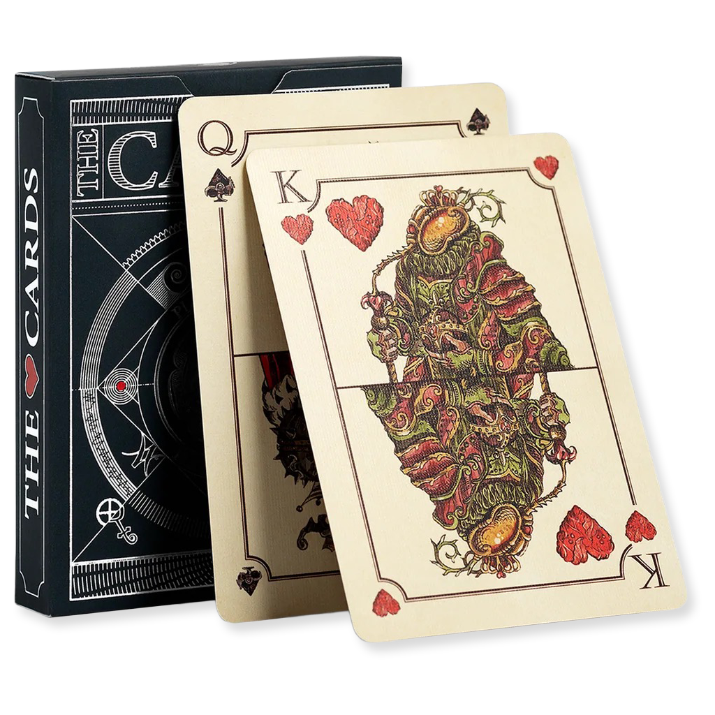 Playing cards with intricate designs and a black box labeled 'The Cards' on a white background