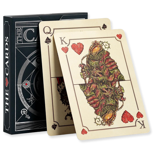 Playing cards with intricate designs and a black box labeled 'The Cards' on a white background