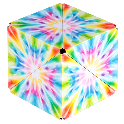 Colorful tie-dye hexagonal toy on a white background