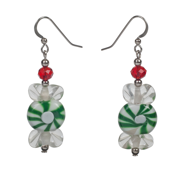 A pair of earrings featuring glass beads made to resemble green and white peppermint candies.