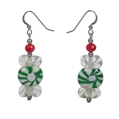 A pair of earrings featuring glass beads made to resemble green and white peppermint candies.